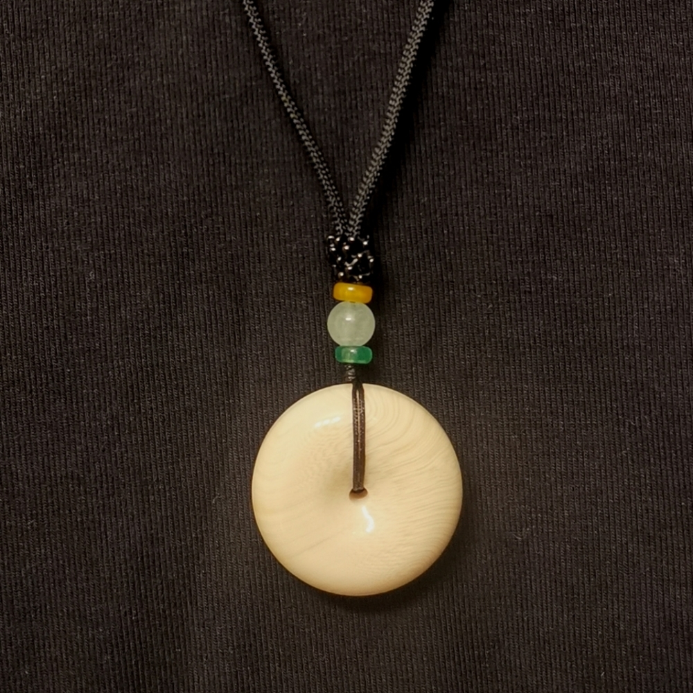 Ivory fruit pendant necklace.
